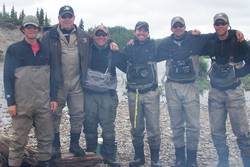 Our son Tyler with his dad and all the fishing guides. (New Halen Lake Lodge 2012)